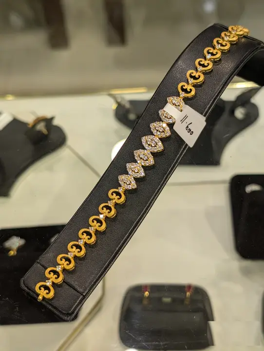 Yellow Gold Bracelet with Cubic Zirconia design 24 by TAHERI