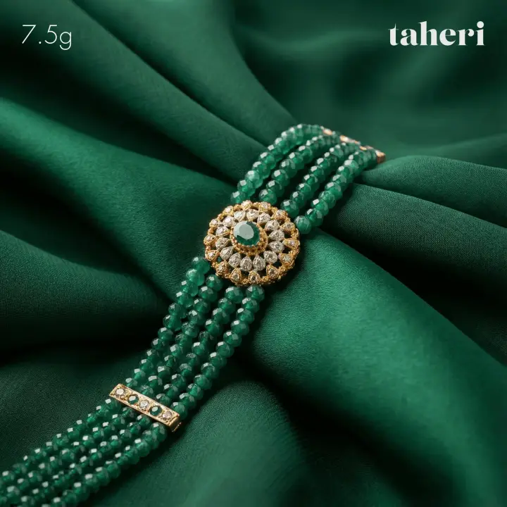 Yellow Gold String Bracelet with Emerald design 8 by TAHERI