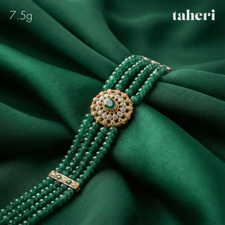 Yellow Gold String Bracelet with Emerald design 4 by TAHERI